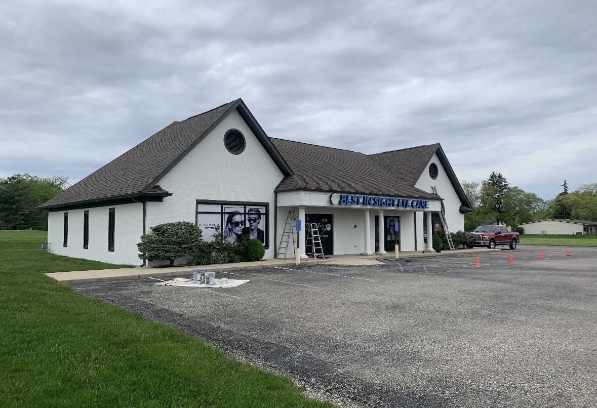Commercial exterior transformation, before finishing coat